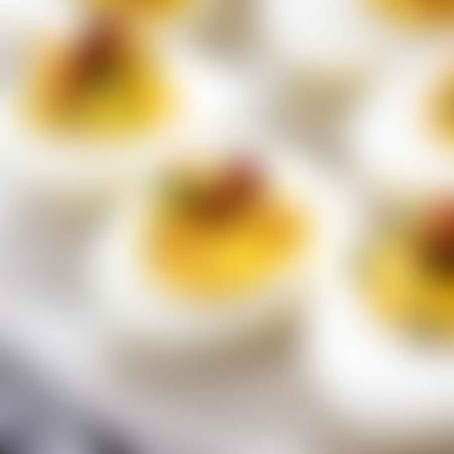 Chef Jax seasoning deviled eggs with love